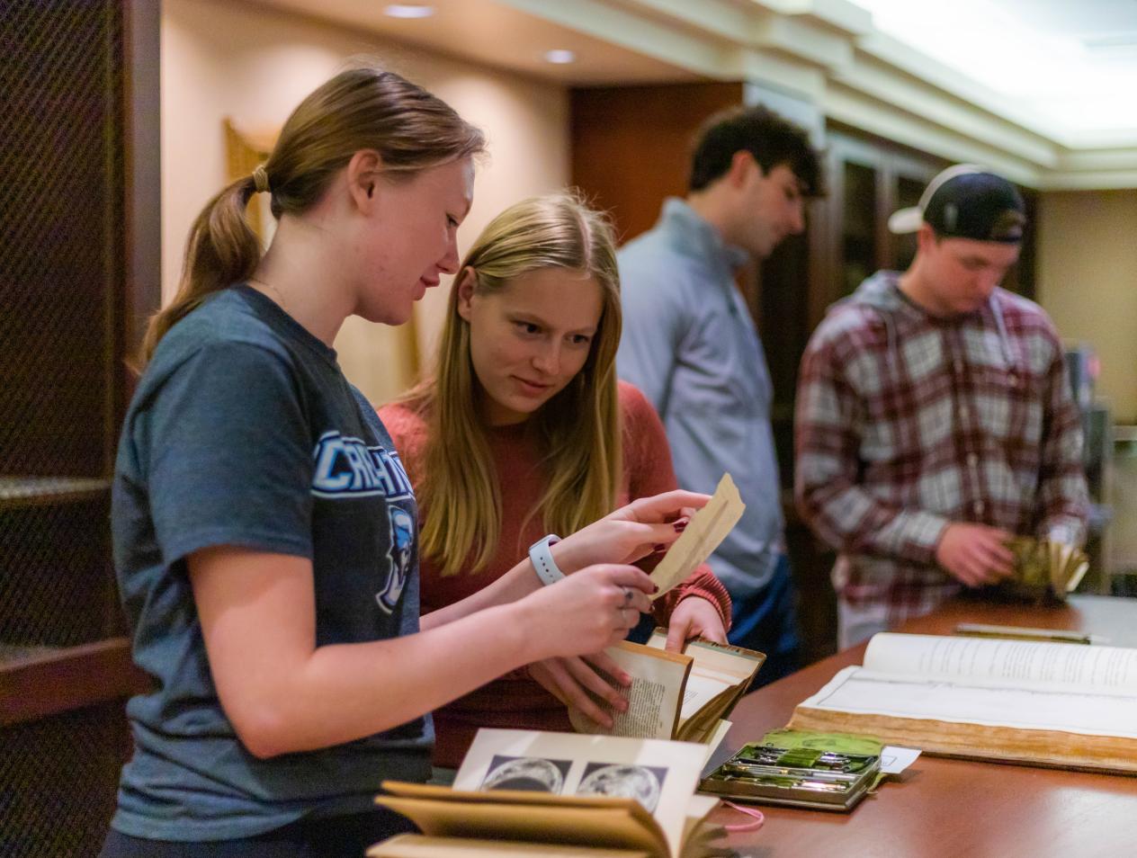 Students Looking at rare books