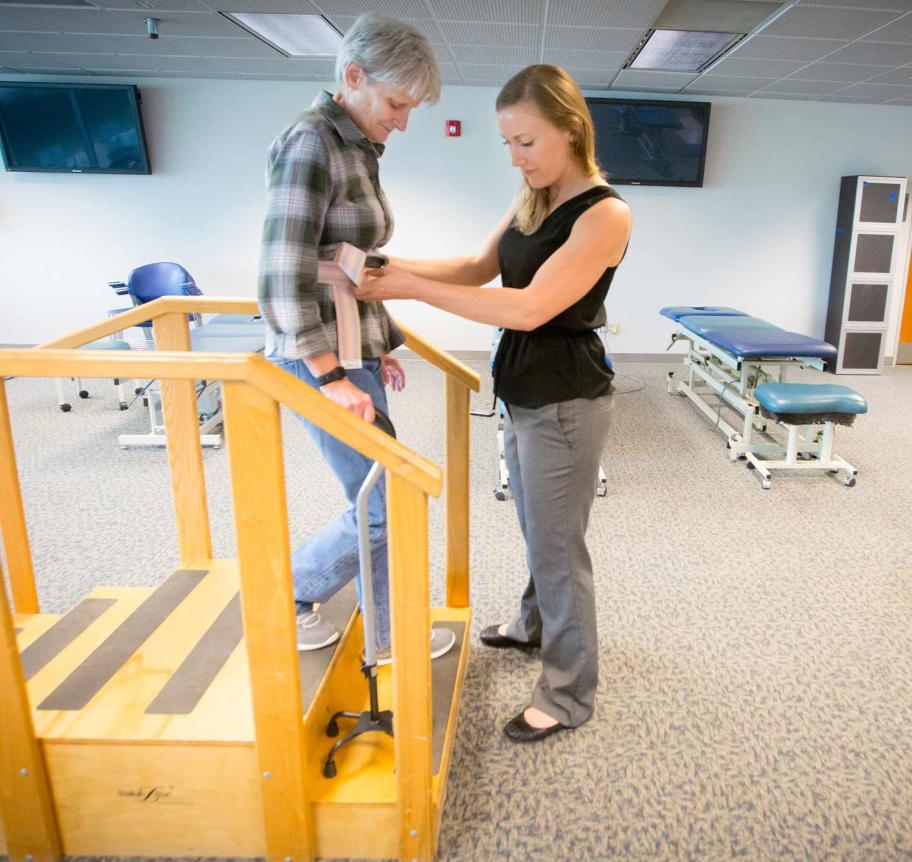 Occupational therapy student working with patient