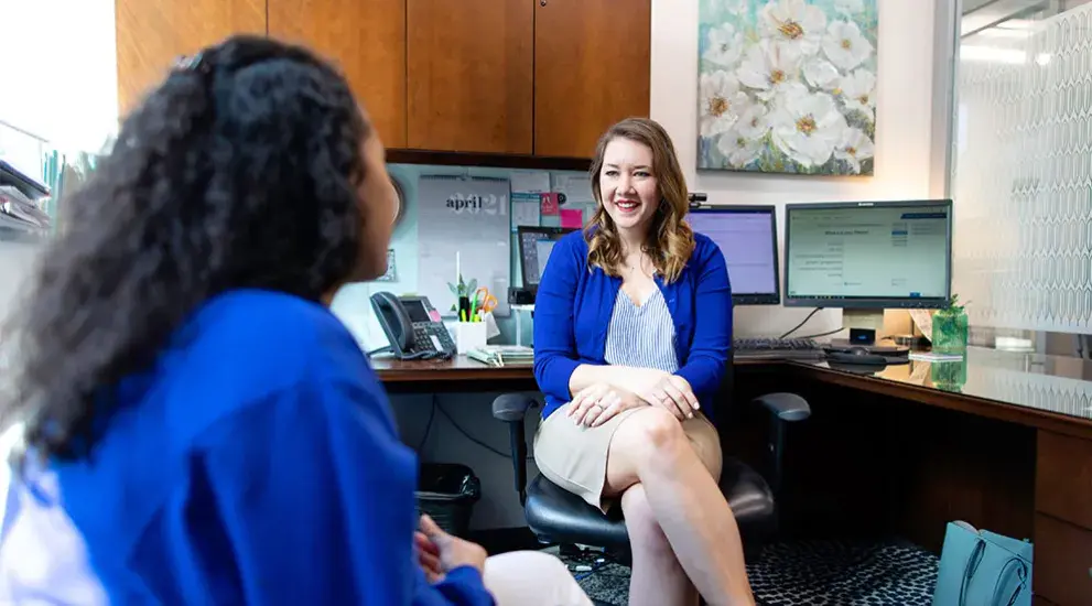 Financial counselor talking with student