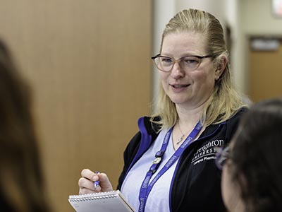 Jess Cumber taking notes