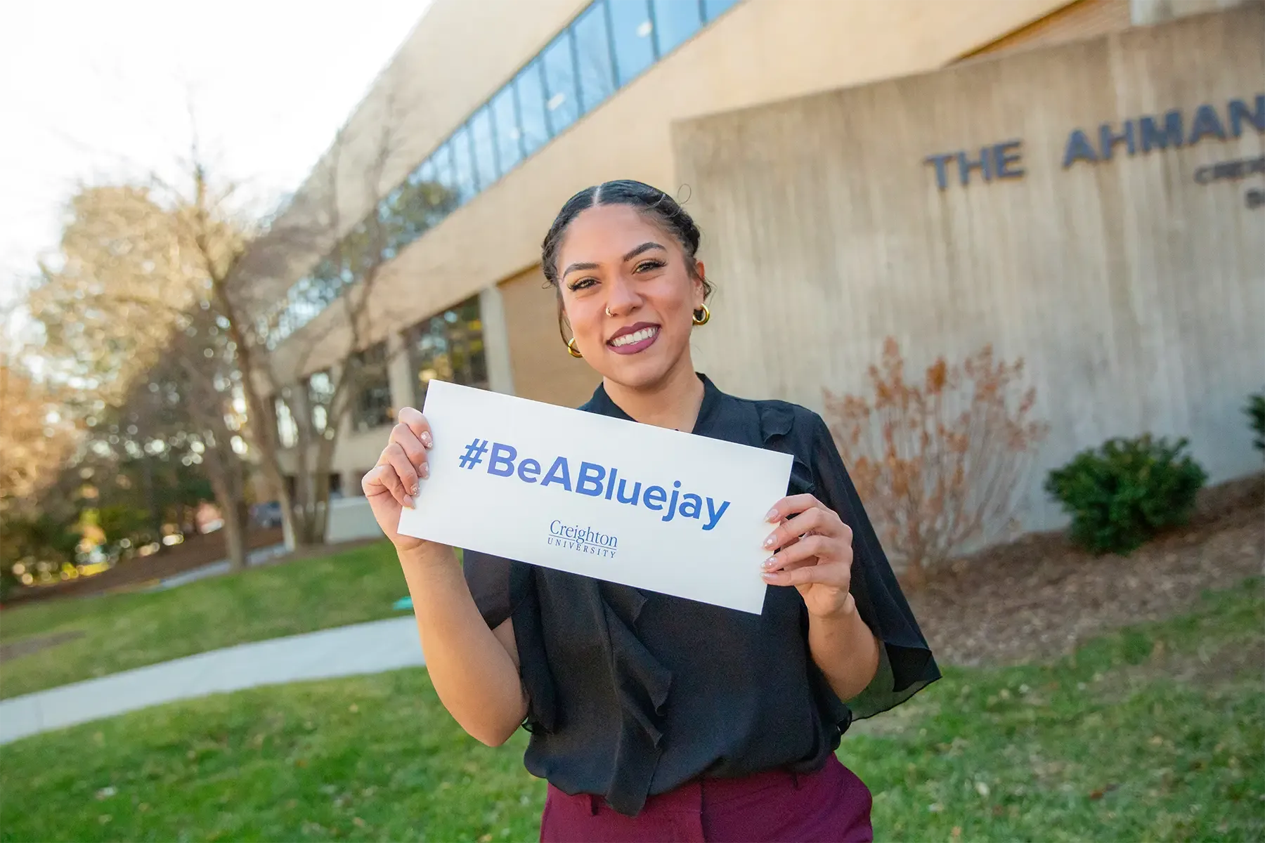 Jackson with #BeABluejay sign