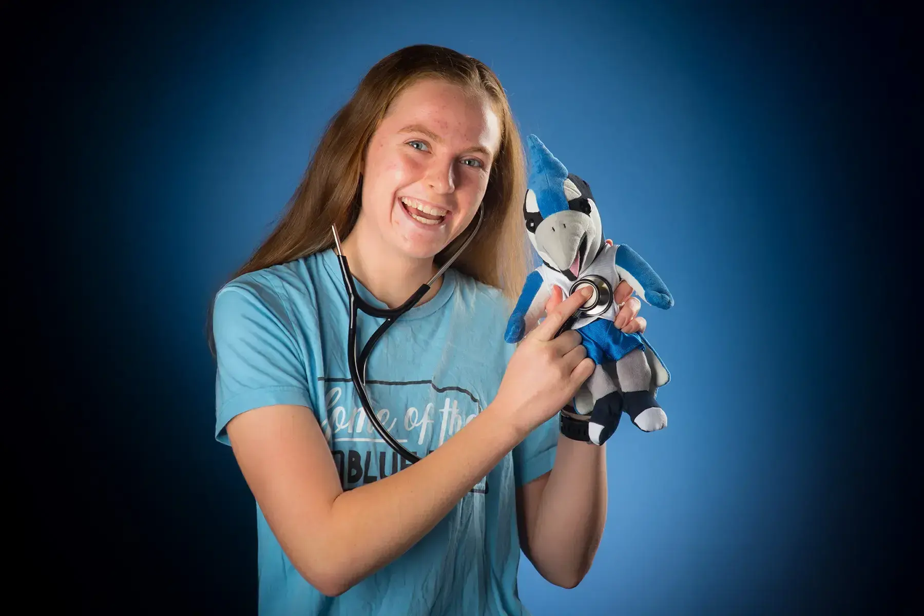 Dani Sasek holding plush Bluejay