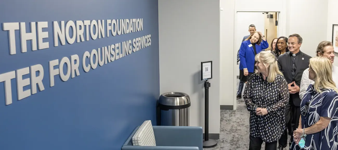 People touring through new facility at dedication.