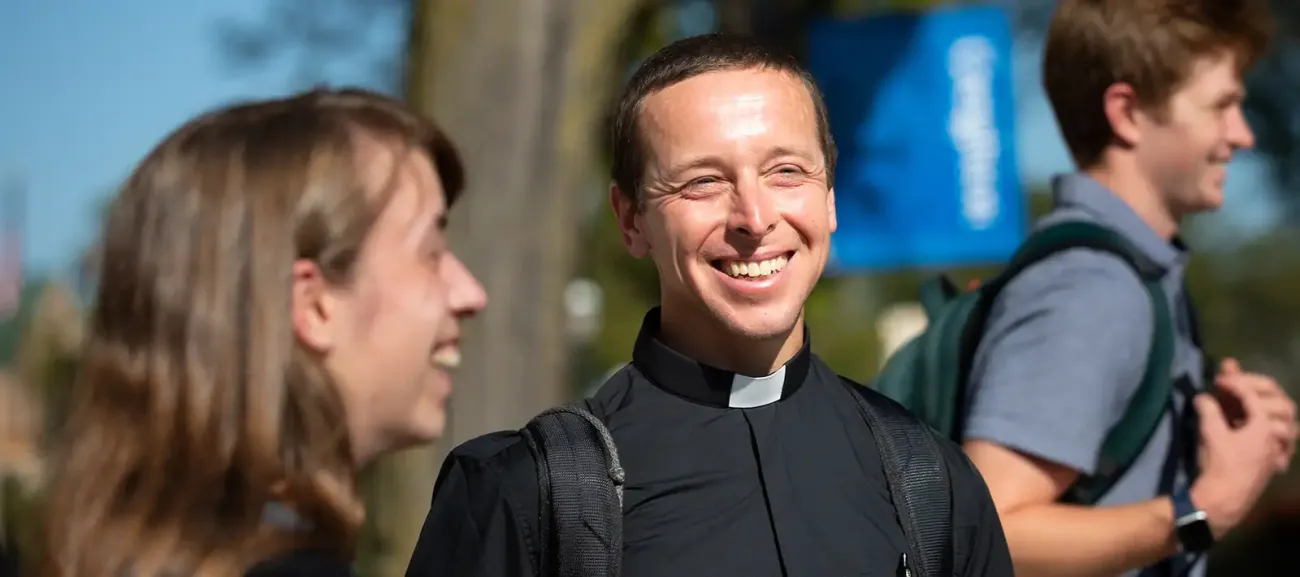 Rev. Christopher Krall attending outside event at Creighton.