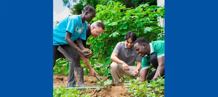 Creighton Africa Trip Planting Tree