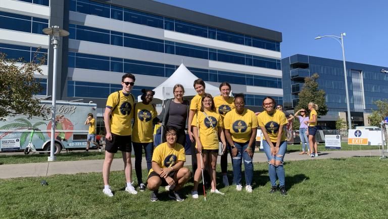 student volunteers at food truck world tour