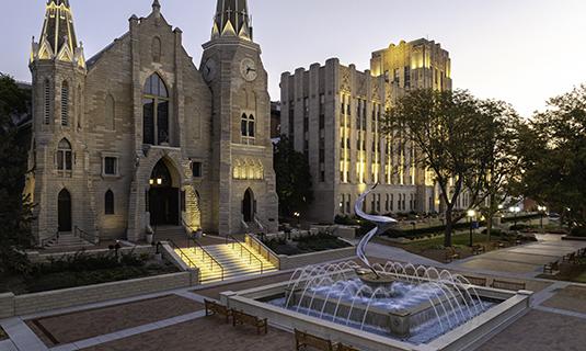 Early morning campu near St. John's church and fountain.