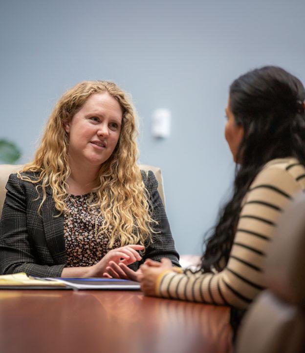 two women consulting at clinic