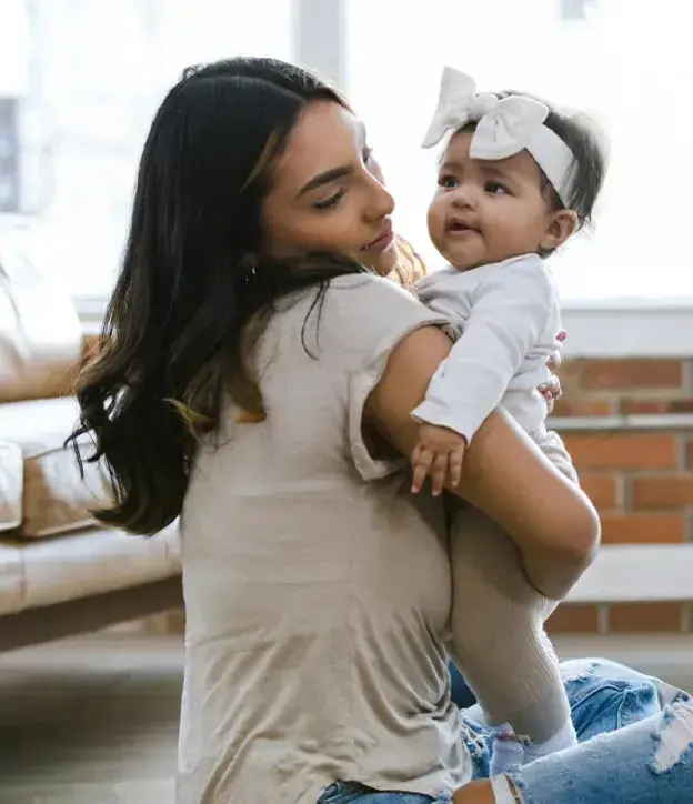 Mother holding her baby