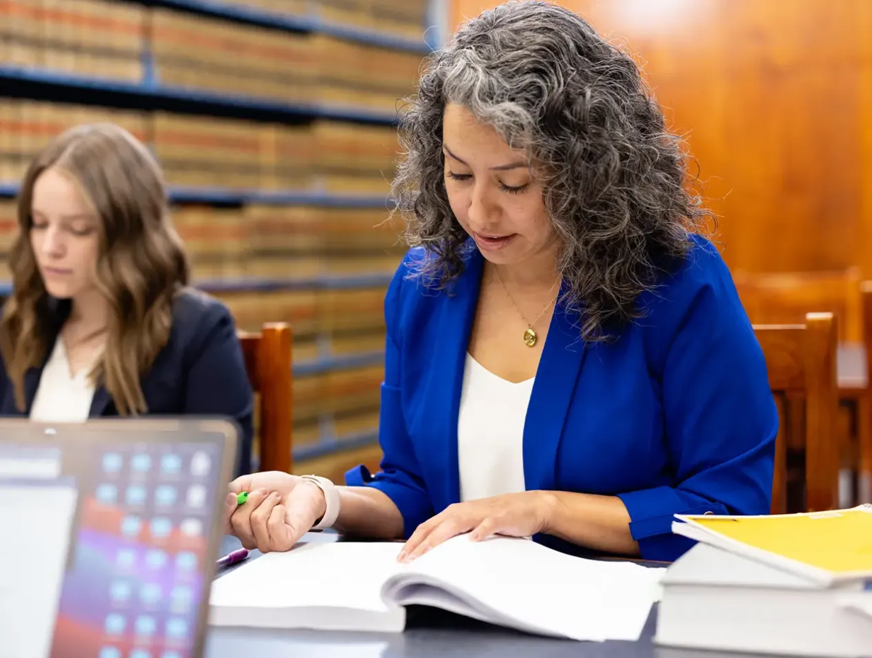 Two students studying in Law Library.