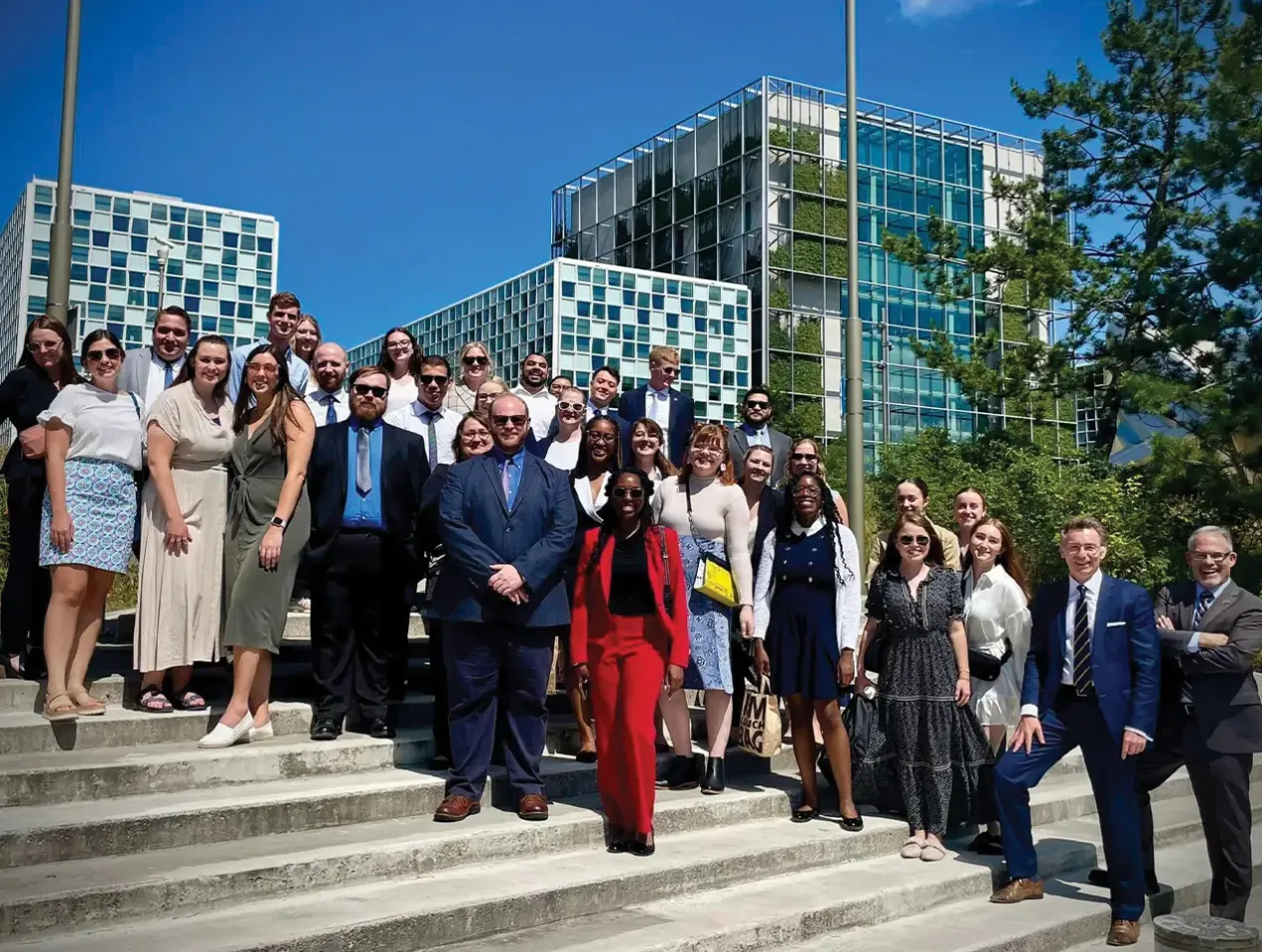 Creighton law group abroad on building steps