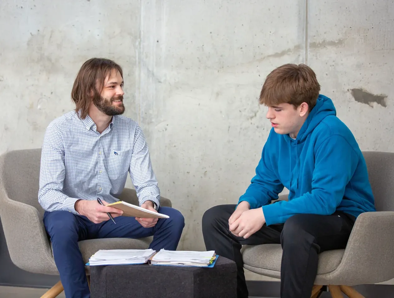 Law student talking with community member