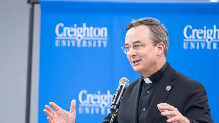 Father Hendrickson at dedication ceremony.