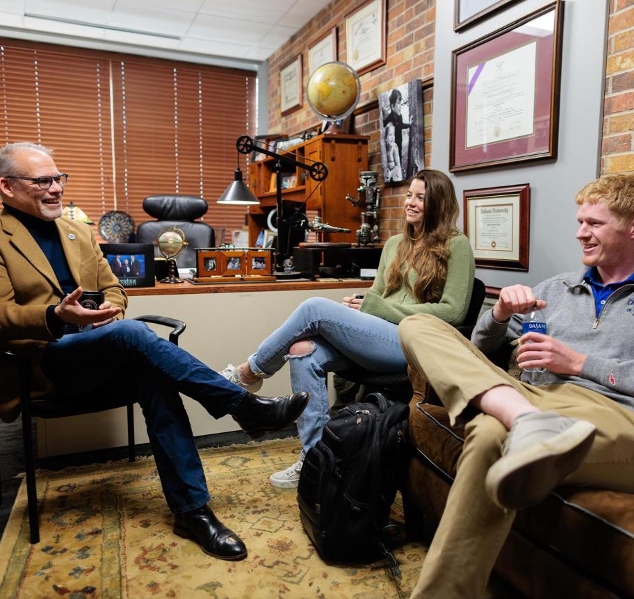 Law students meeting with professor