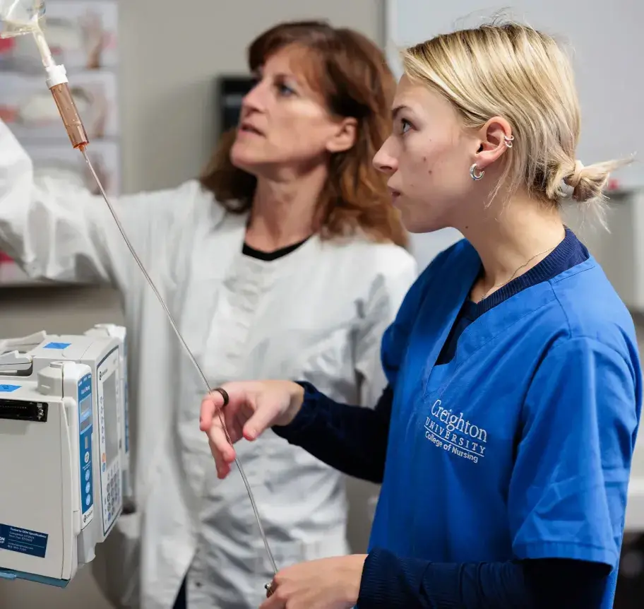 Nursing student working with mentor