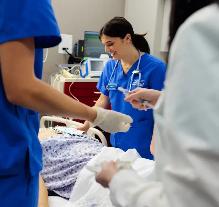 Nursing students working with patients.