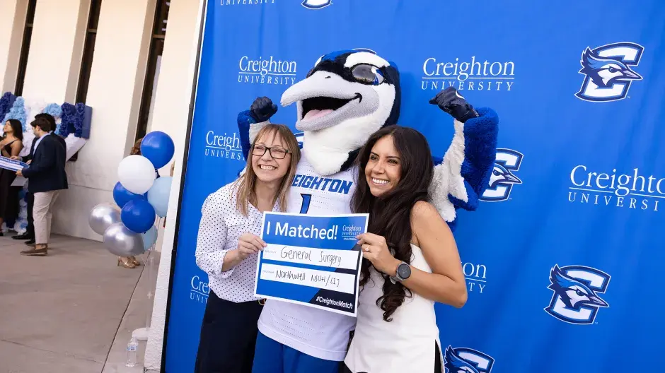 Billy Bluejay with students at Match Day 2026